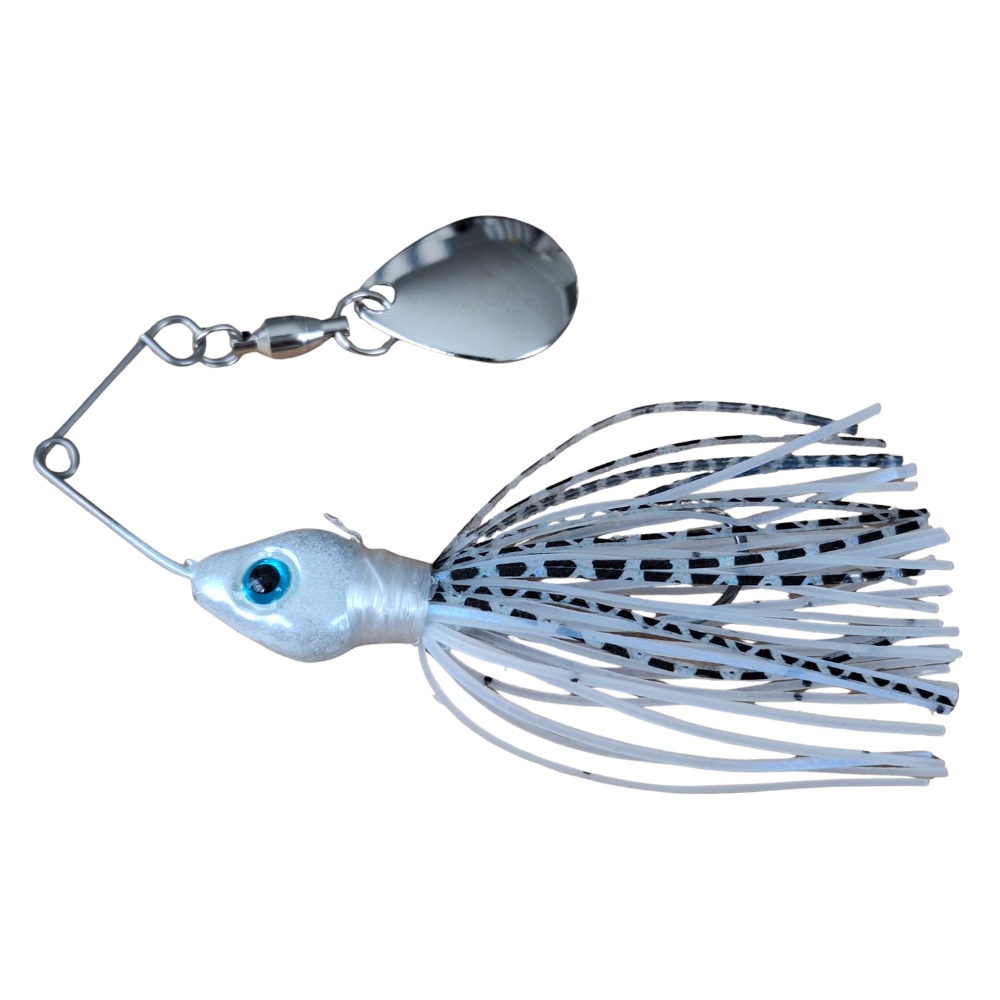 Fishing lure with a metal spoon and spinner on a white background